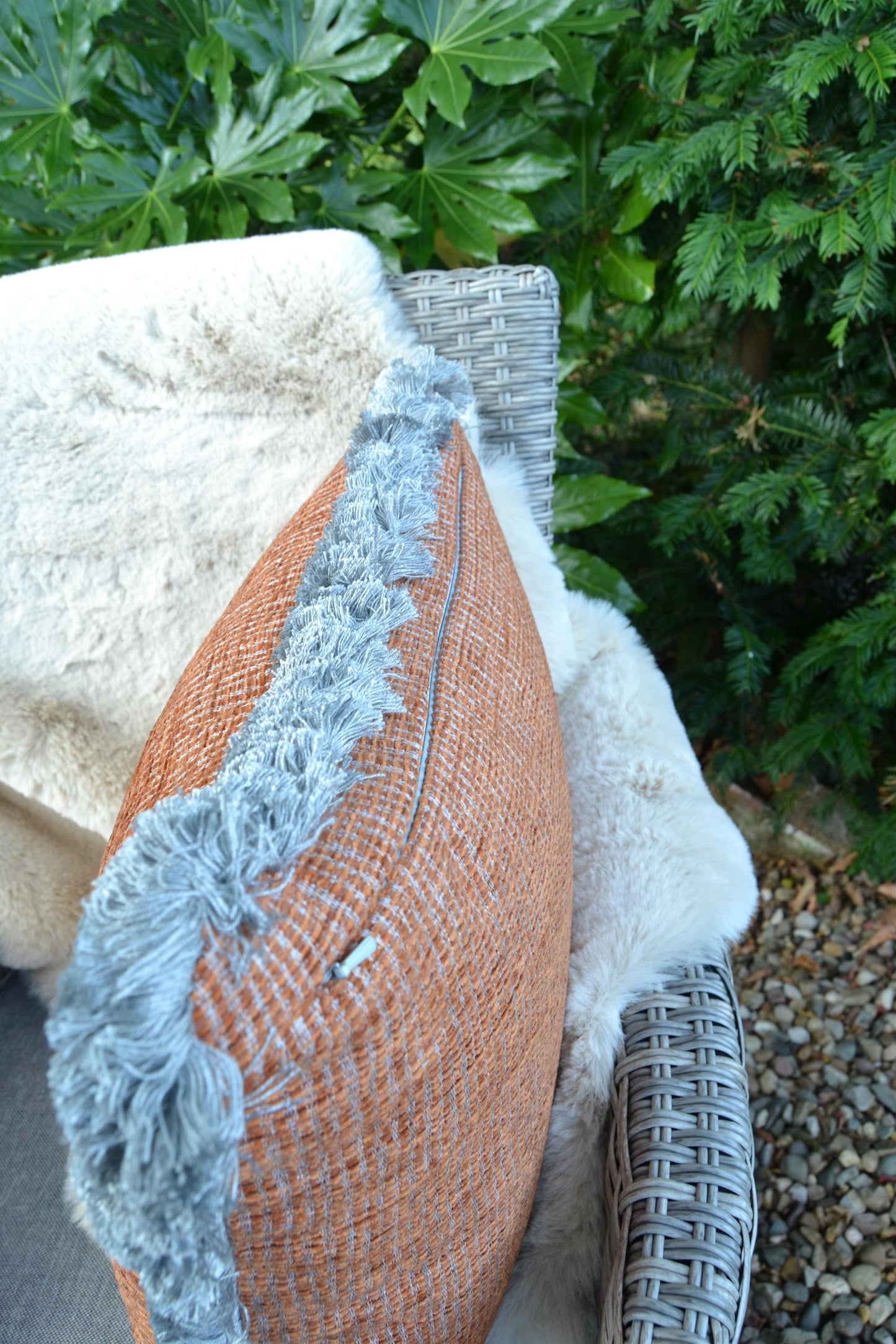 TRUENO- Handmade rust and grey woven fabric cushion cover with fringe