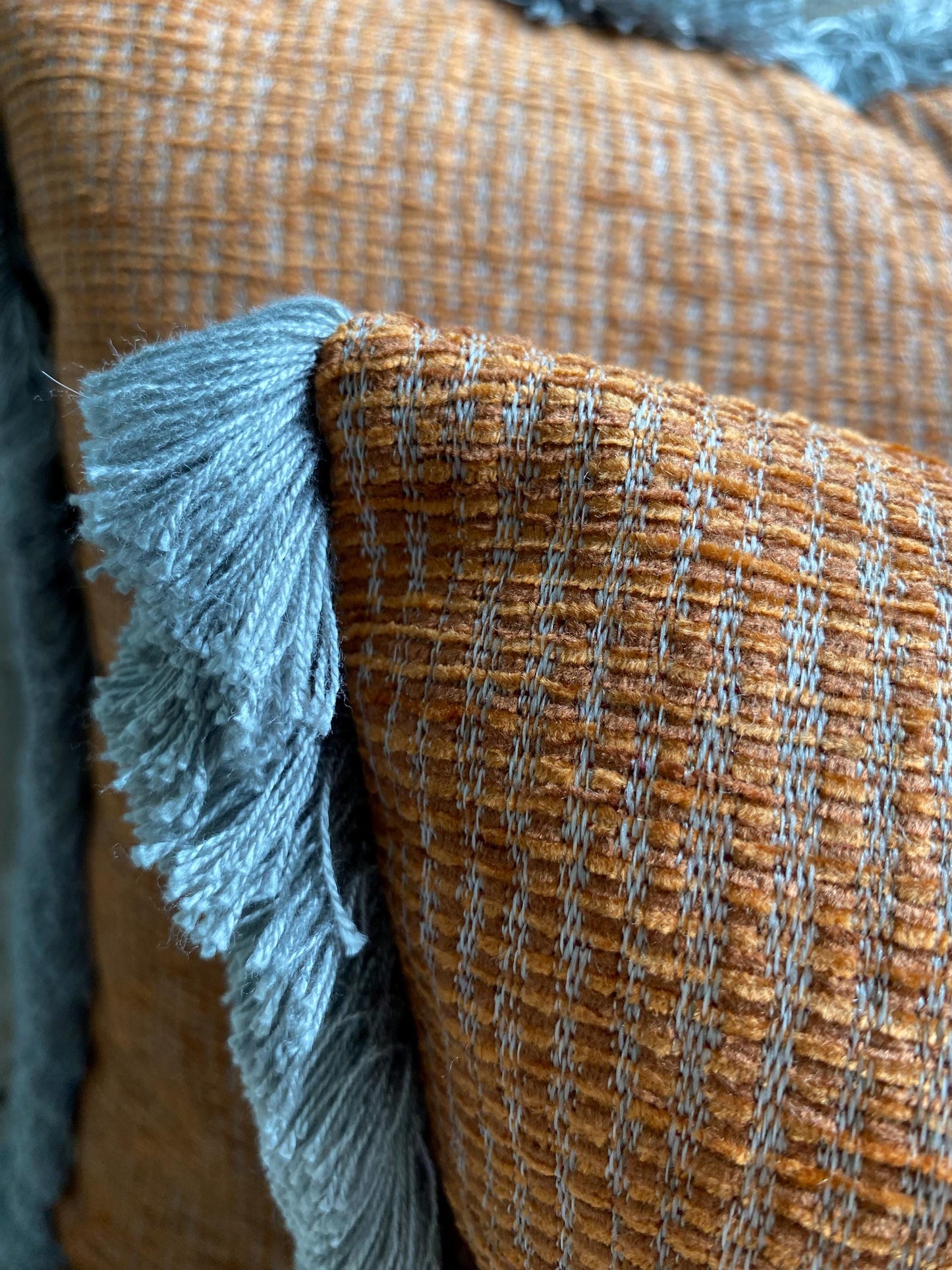 TRUENO- Handmade rust and grey woven fabric cushion cover with fringe