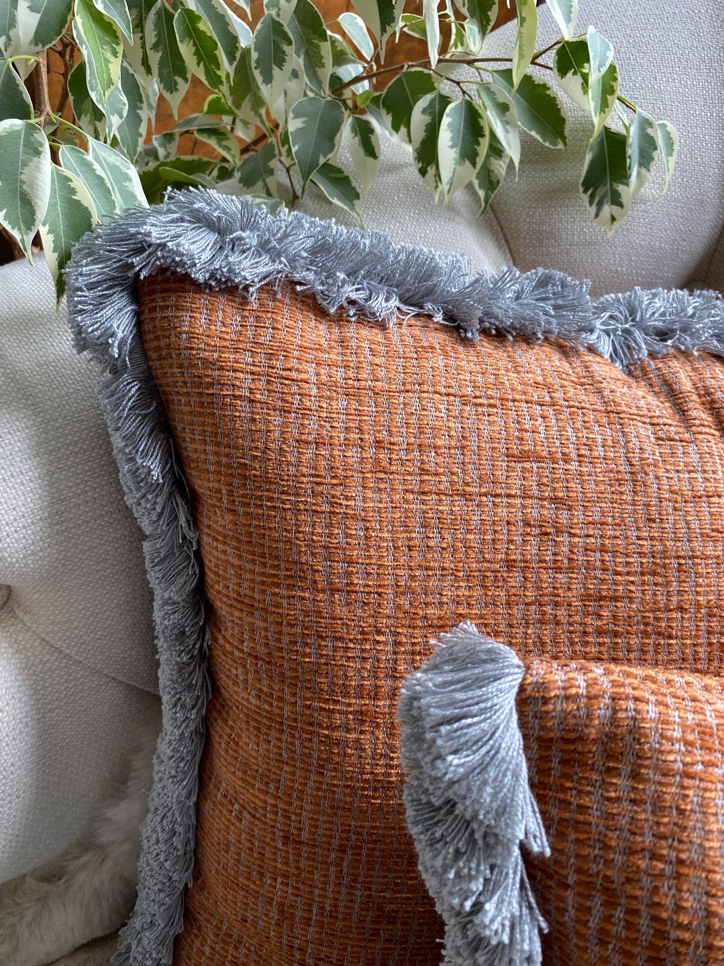 TRUENO- Handmade rust and grey woven fabric cushion cover with fringe