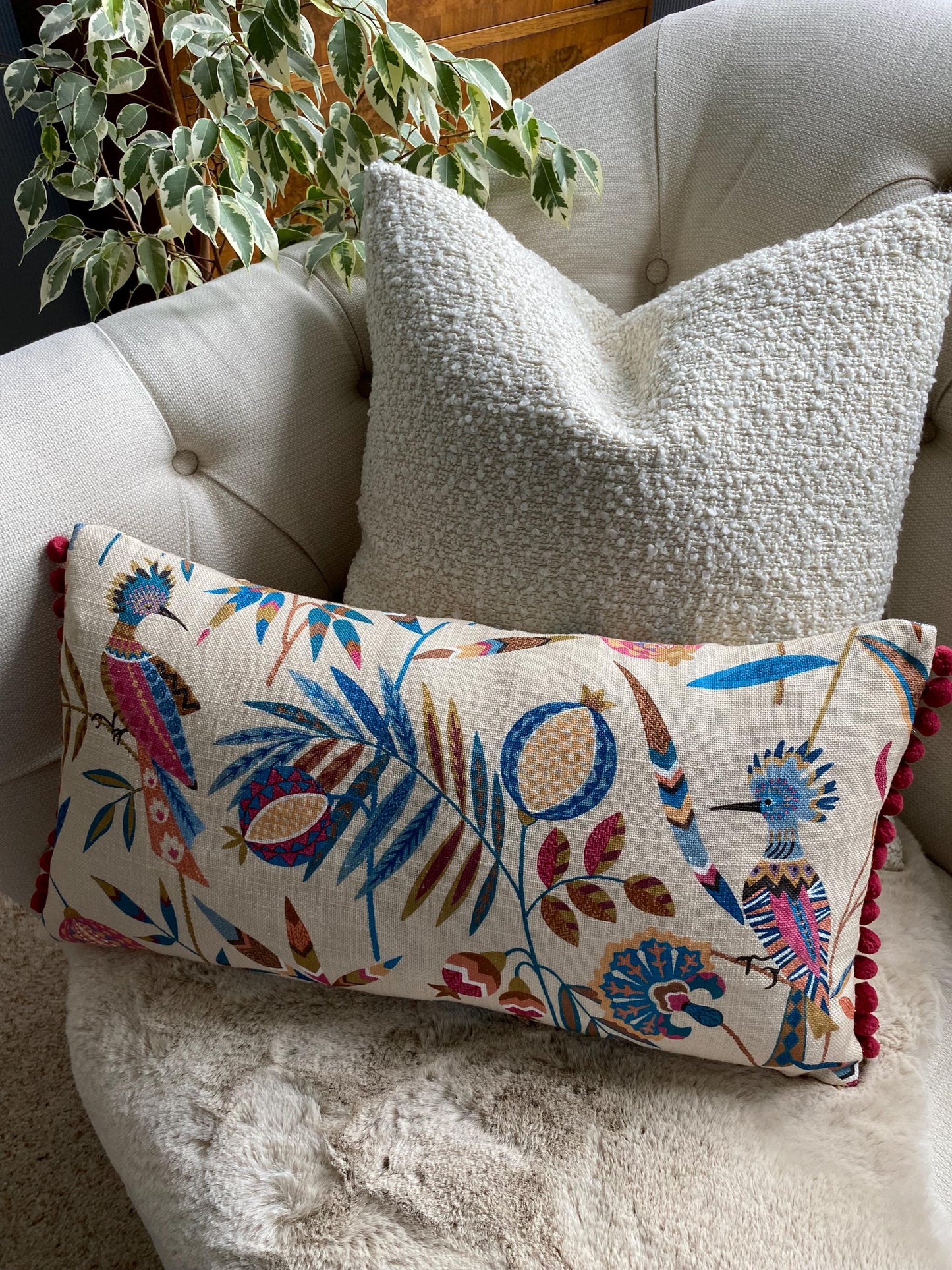 PARADISA - Handmade lumbar cushion cover with modern botanical design and pom pom trim.