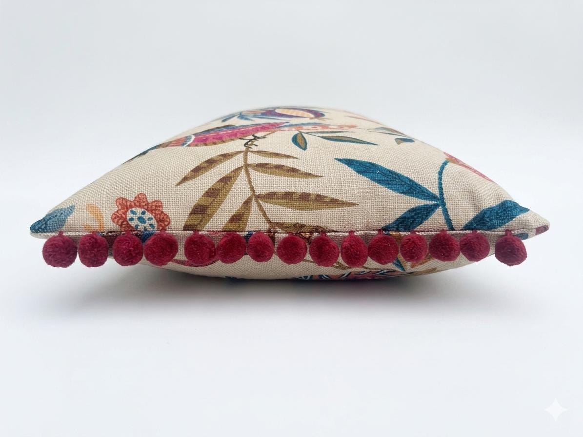 PARADISA - Handmade lumbar cushion cover with modern botanical design and pom pom trim.