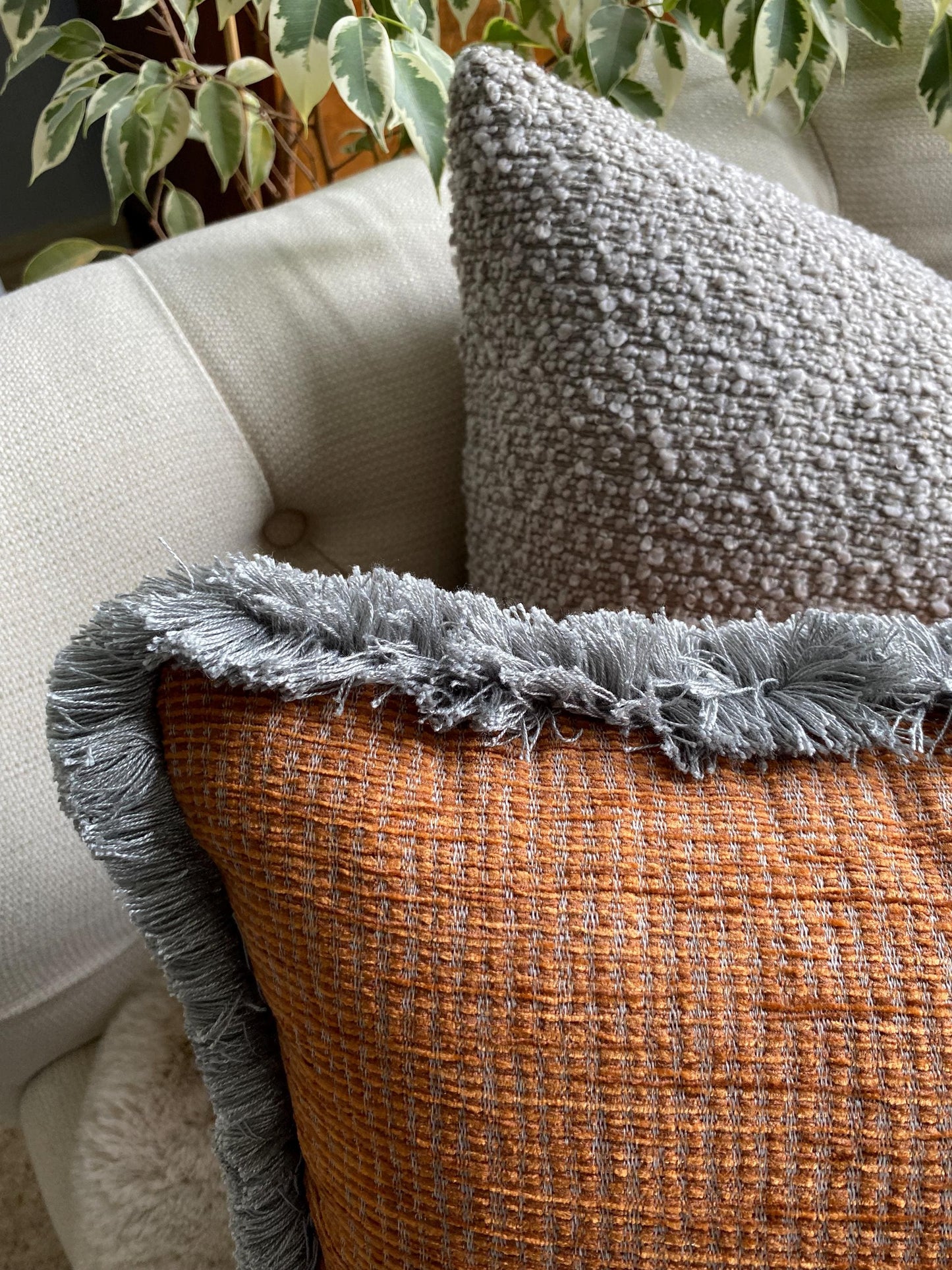 TRUENO- Handmade rust and grey woven fabric cushion cover with fringe