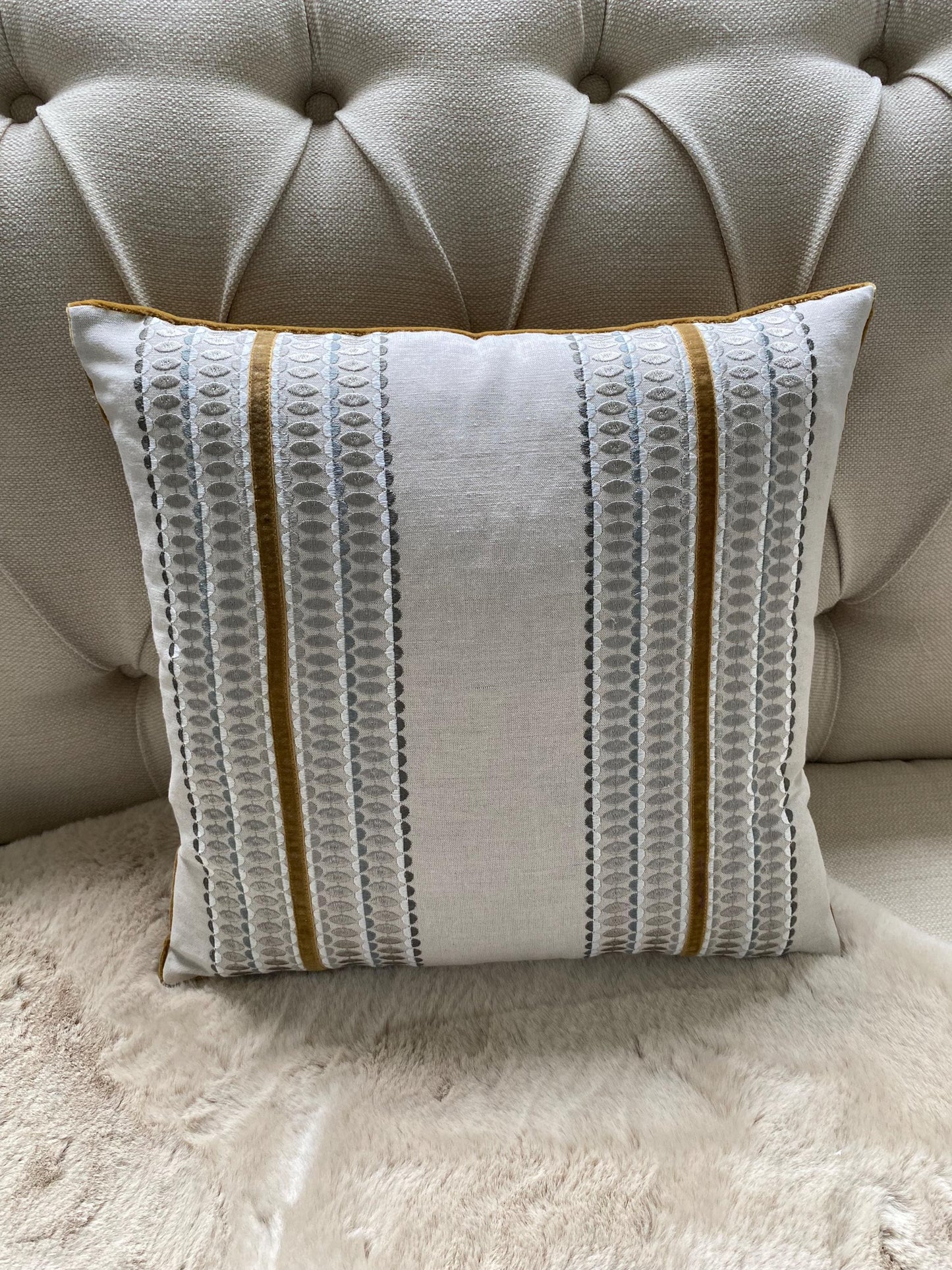 LARA - Handmade embroidered cushion cover with ochre appliqued trim.