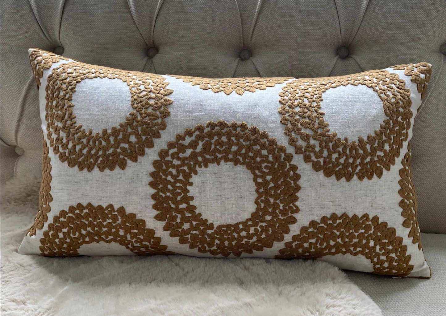 SAFI- Handmade cushion cover with cinnamon embroidered circular motifs on cream background.